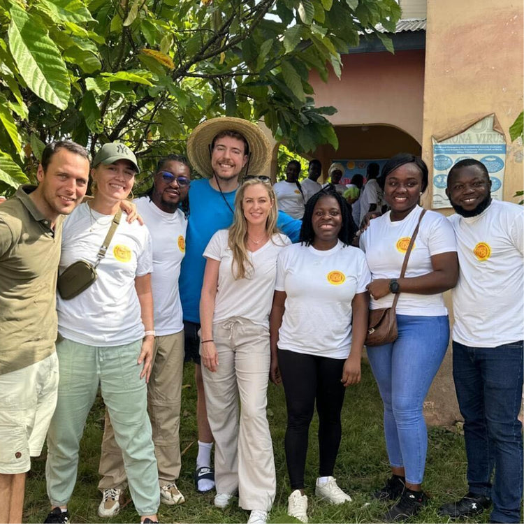 Jimmy alongside members of both the Feastables and Tony's Open Chain teams.